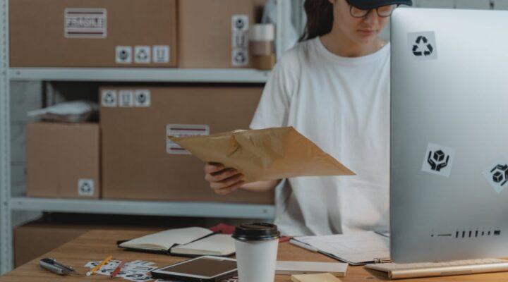 Chinese e commerce warehouse with shelves of neatly stacked custom printed shipping boxes in different sizes showing efficient space usage