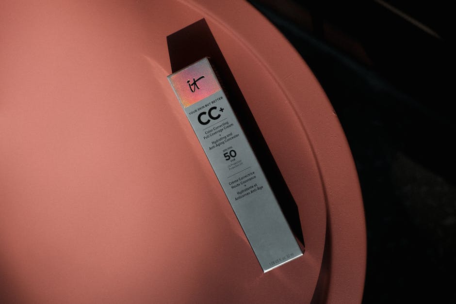 Close up of luxurious custom paper boxes with embossed logos foil stamping and eco labels showcasing high end branding for fashion or beauty products on a neutral background