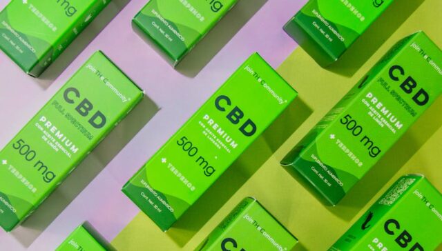 Vibrant collage of modern sustainable packaging examples including paper based boxes smart QR coded labels and premium embossed designs on a global brand shelf display