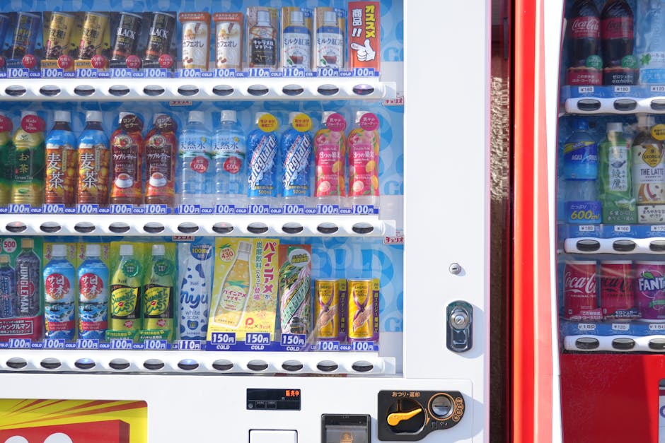 Close up of a young urban professional grabbing a branded coffee pouch from a street vending machine surrounded by skyscrapers and diverse commuters highlighting convenience and branding
